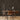 Home office with Ashlar1 Gunstock Mosaic Wood Wall Tiles behind a desk and chair