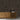 Ashlar2 Gunstock Mosaic Wood Wall Tiles behind a wooden console table