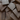 Close-up of natural peel and stick real wood planks with varied textures and warm brown tones scattered on a surface