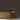 Brick Gunstock Mosaic Wood Wall Tiles behind a wooden console table