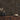Cobblestone Gunstock Mosaic Wood Wall Tiles behind a wooden cabinet with vases and a gold bowl
