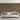 Living room with Ashlar2 Natural mosaic wood tiles behind a white sofa