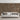 Living room with a white couch against a Brick Natural mosaic wood tile wall