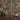 Cobblestone Natural Mosaic Wood Wall Tiles as a backdrop for vases and a bowl on a wood cabinet