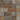Assortment of natural reclaimed wood pieces arranged in a varied cobblestone pattern for a peel and stick feature wall