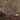Herringbone Natural Mosaic Wood Wall Tiles behind a wood cabinet with vases and a decorative bowl
