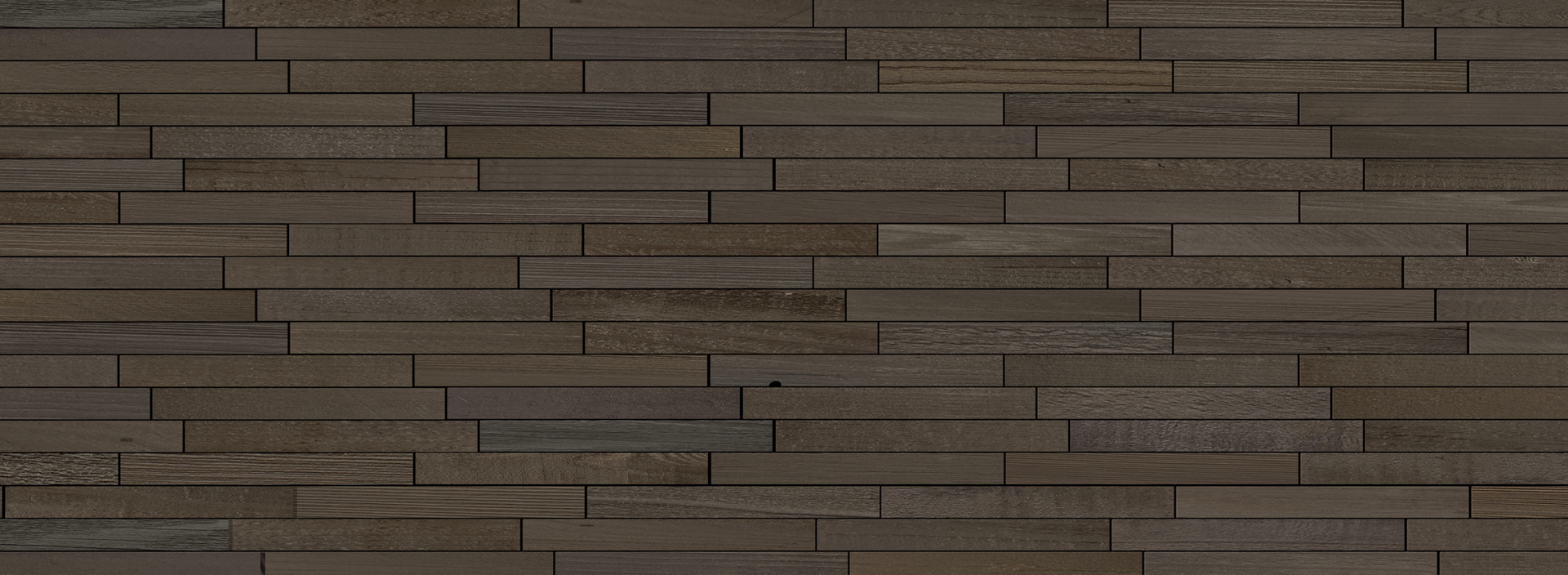 Dark natural wood plank wall with varied widths creating a textured peel and stick feature wall
