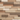 Close-up of natural wood plank arrangement showcasing varying tones and textures for a peel and stick accent wall