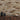 Hardwood Brick Wheat Mosaic Wood Wall Tiles behind a wooden cabinet with vases